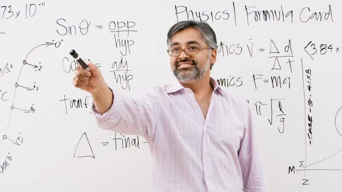 Teacher in Front of Whiteboard