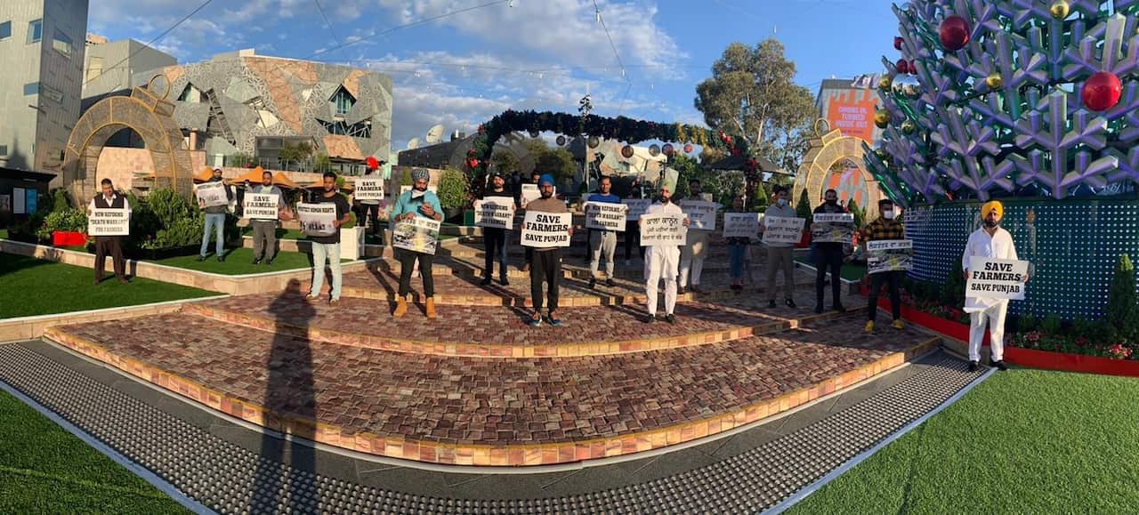 A group of protesters at the Federation Square, Melbourne.