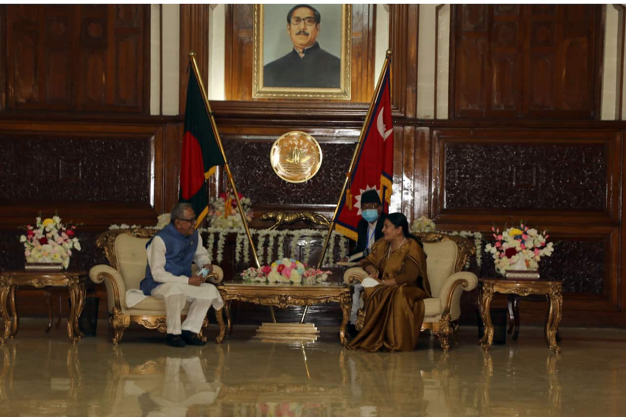 Nepal's President Vidya Devi Bhandari in conversation with Bangladesh's President Mohammad Abdul Hamid during her visit to the country.