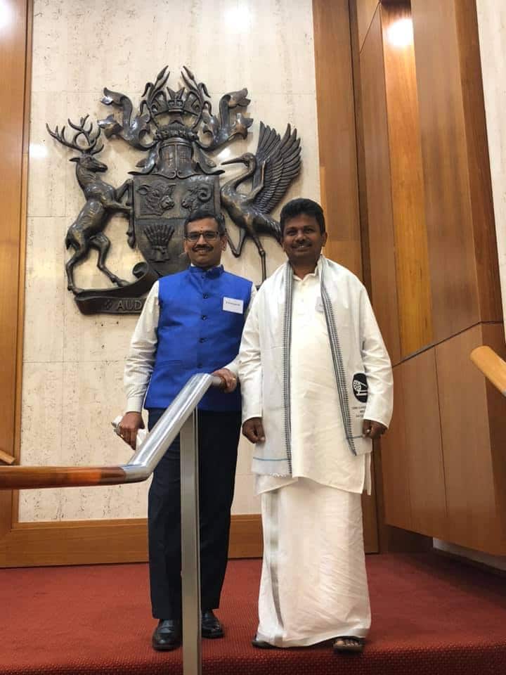 Mr Thevar (R) with a friend. 