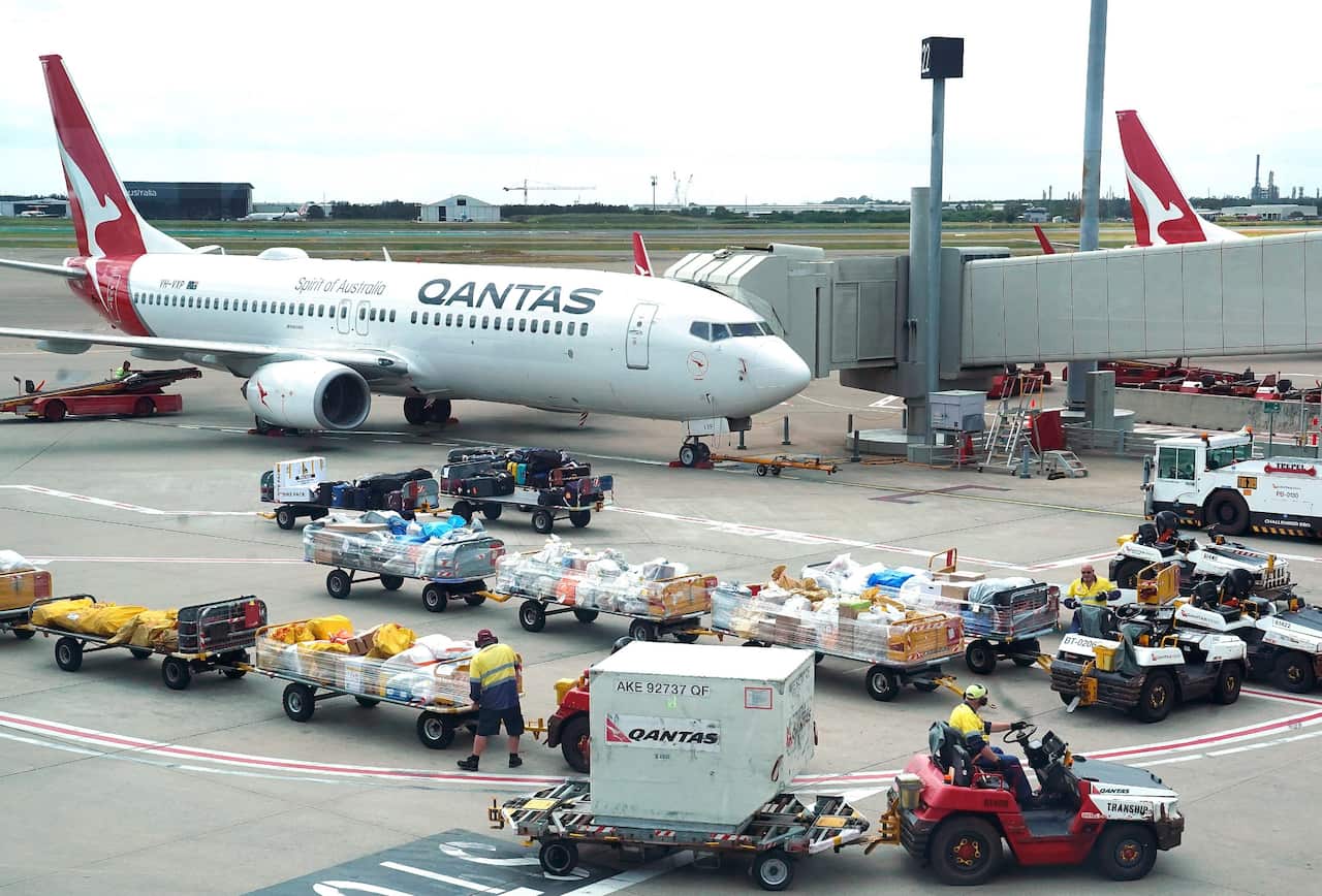Qantas ground staff at the Brisbane domestic terminal.
