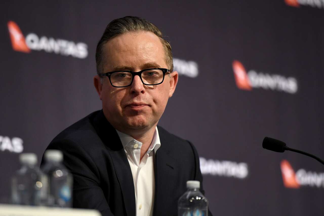 qantas to shed 6000 jobs, 