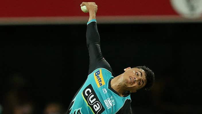 Mujeeb Ur Rahman of the Heat bowls the ball during the Big Bash League (BBL) match between Brisbane Heat and the Adelaide Strikers