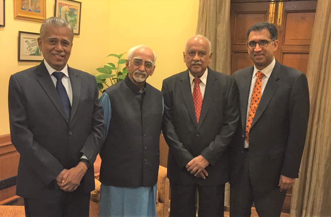 Mr T Janardhana Rao and his son Harish Rao with Hamid Ansari