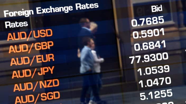 The Australian dollar exchange rates are displayed on the Australian Stock Exchange (ASX) trading board in Sydney, Thursday, Sept. 29, 2016. (AAP Image/Mick Tsikas) NO ARCHIVING