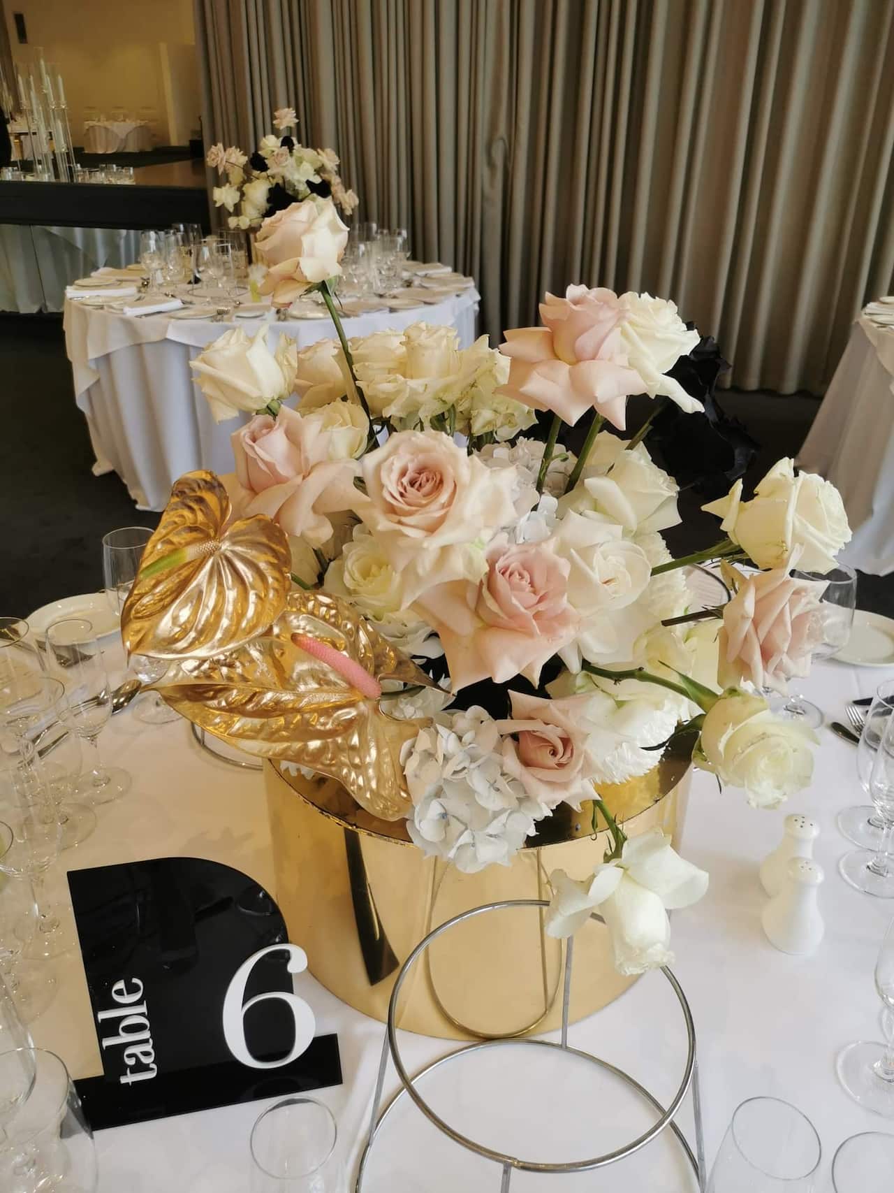 Flower arrangement for Centrepiece on the table at a wedding