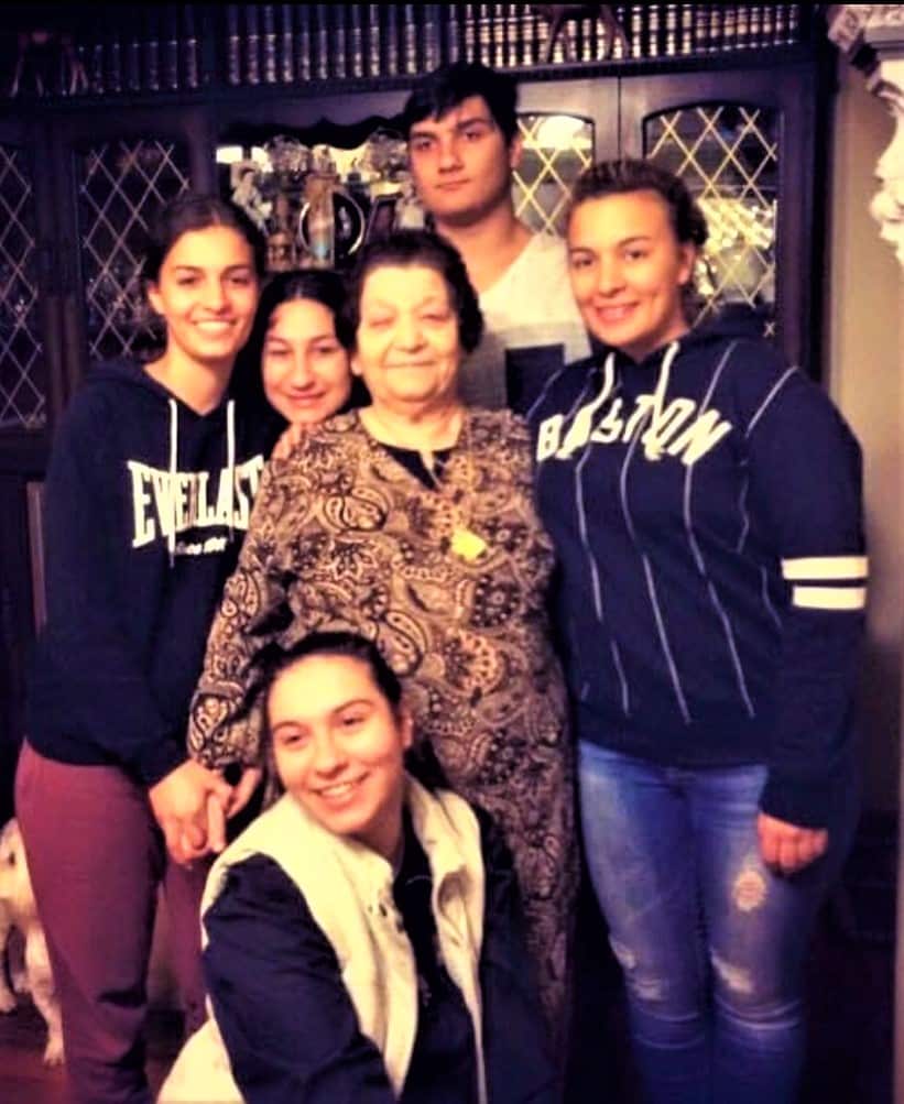 Mrs Maria Vasilakis with members of her family. 