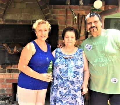 Mrs Maria Vasilakis with members of her family. 