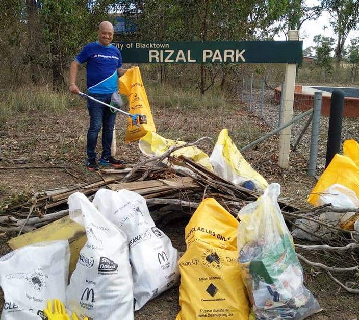 Rod Dingle and the pile of rubbish collected during 2018 Clean Up Up Day