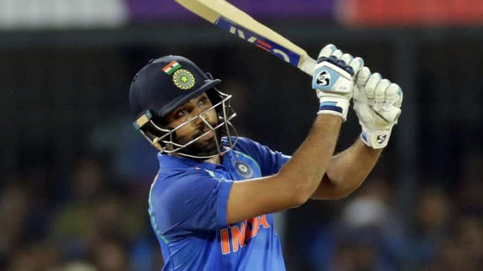 Indian cricket player Rohit Sharma bats during the third one-day international cricket match between India and Australia in Indore, India, Sunday, Sept. 24, 2017. (AP Photo/Rajanish Kakade)