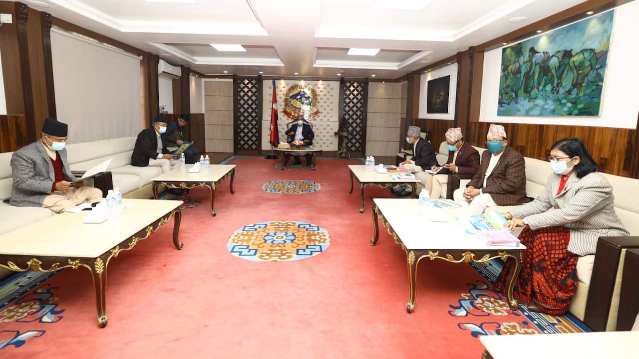 Nepal Prime Minister Sher Bahadur Deuba (centre) at a meeting in Kathmandu.