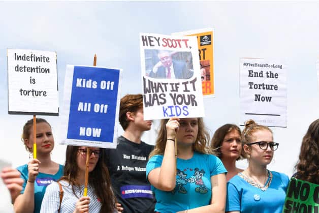 protesters in front of Parliament House, Canberra