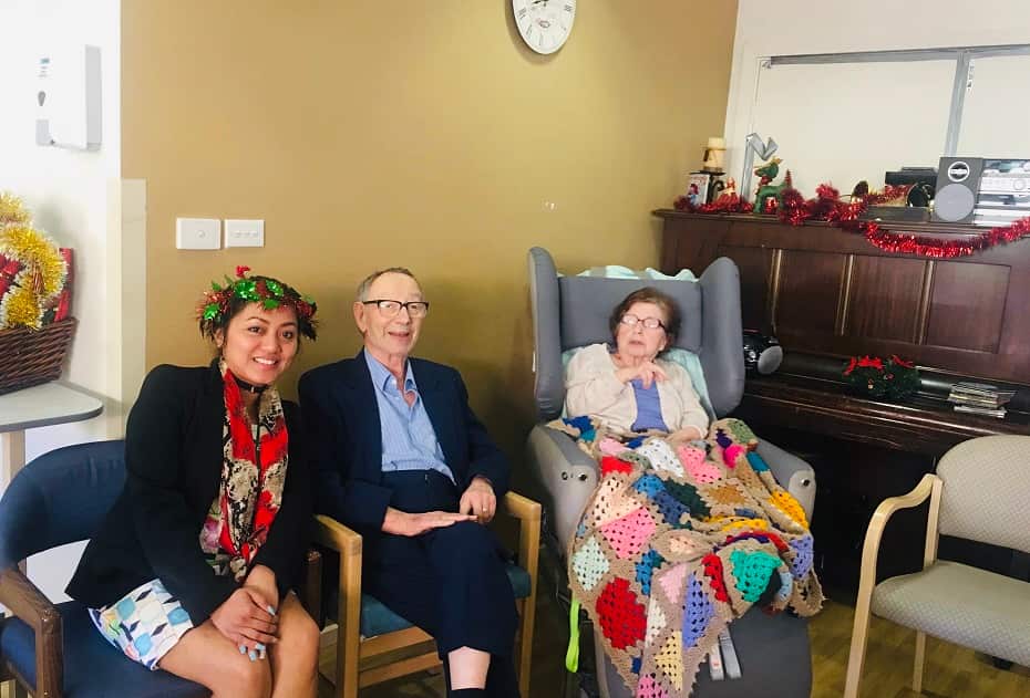 For nurse Rowena Hansen wearing a colourful headdress and scarf is one way of cheering up residents of the facility.