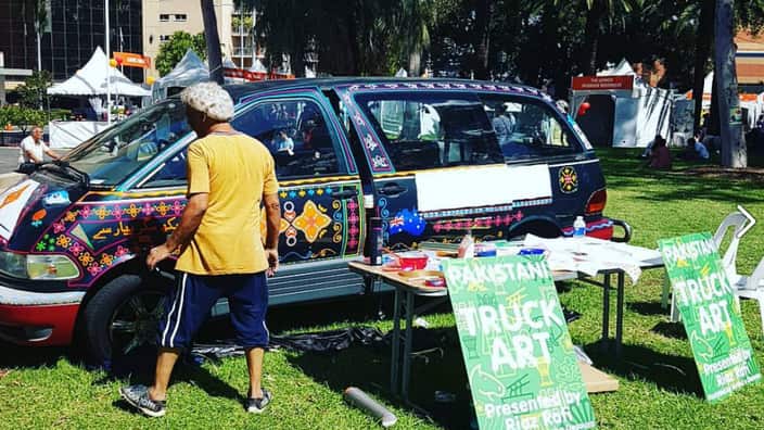 Artist Riaz Rafi joined from Pakistan to demonstrate live truck art