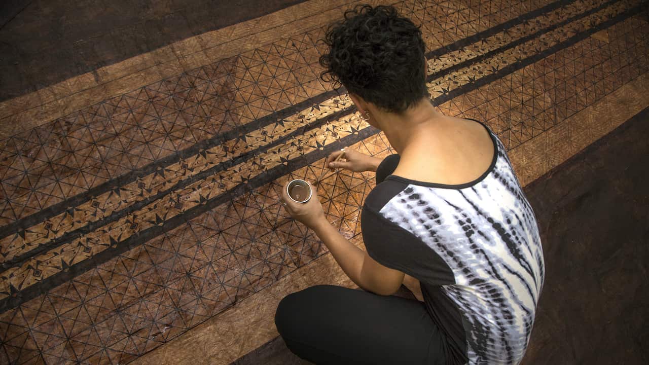 Ruha Fifita - works with earth pigments, natural dyes and tuitui (Candlenut snoot) on ngatu (bark cloth)