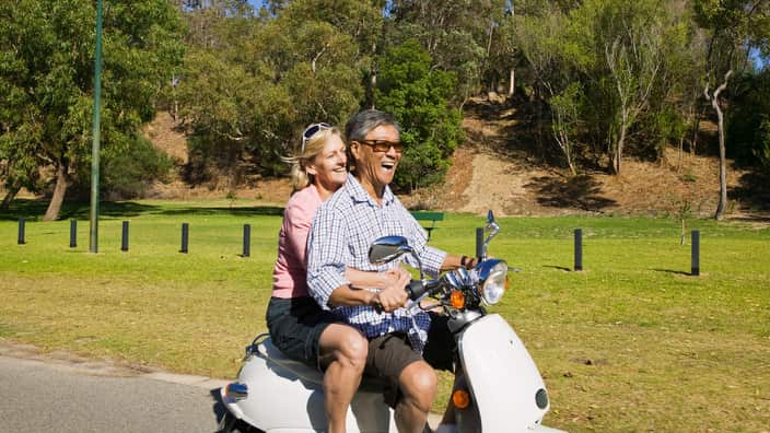 Couple on scooter