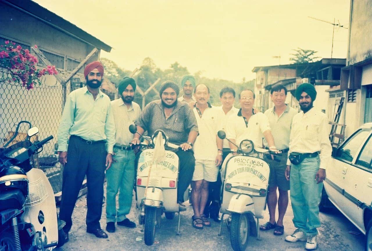 With a group of local people at Kuala Lumpur, Malaysia.