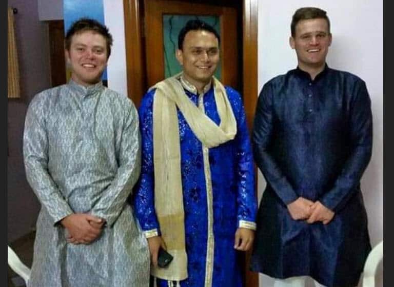 Sahdev Patel (in centre) with his teammates from Guild St Mary's Cricket Club in Geelong, Victoria, Thomas Ward (left) and Kevin O'Leary (Right) during his wedding in 2016 at Baroda, Gujarat. 