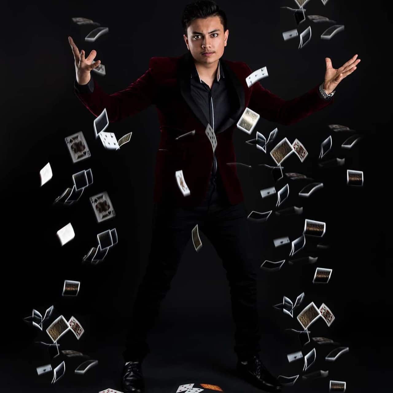 Saksham Sharma performing a magic Show