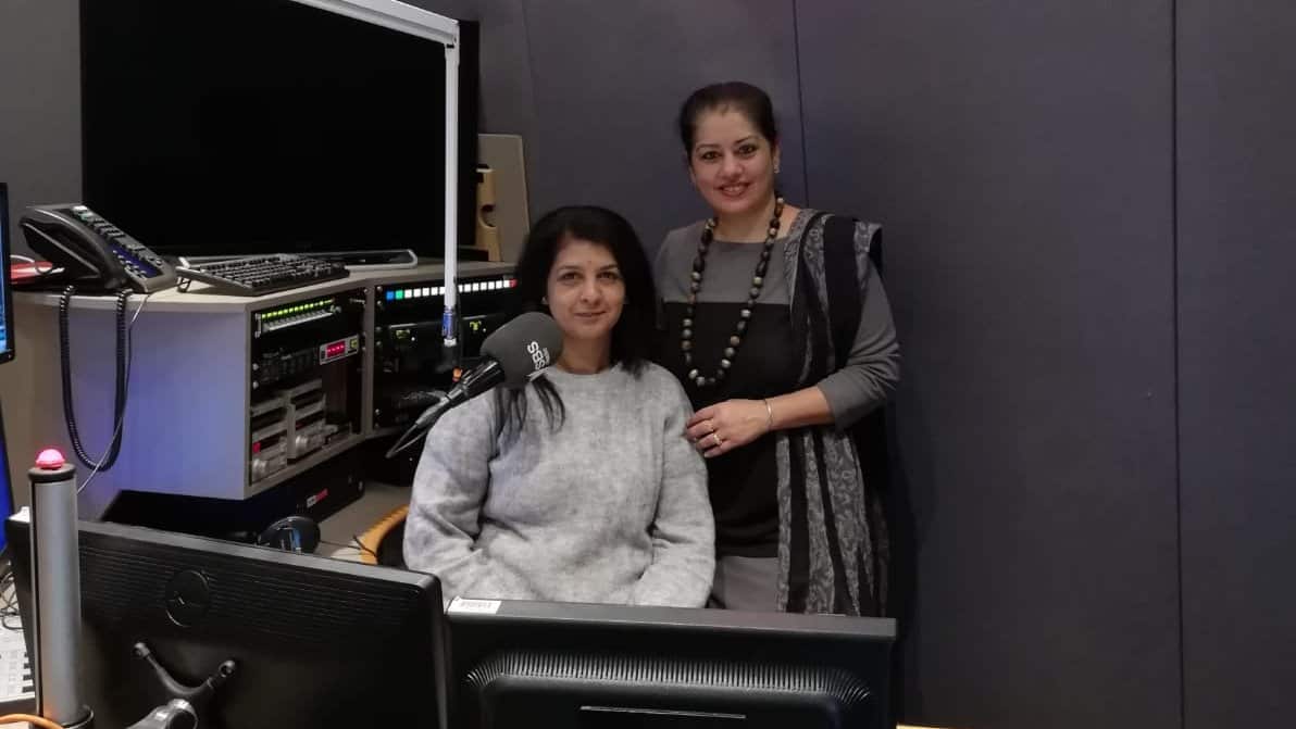Sarbjit Kaur Athwal at SBS studios in Melbourne, with SBS Punjabi's Manpreet Kaur Singh 