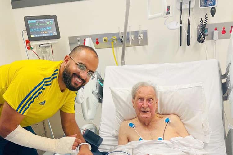 Mr Al-Harbi and his neighbour while in hospital.