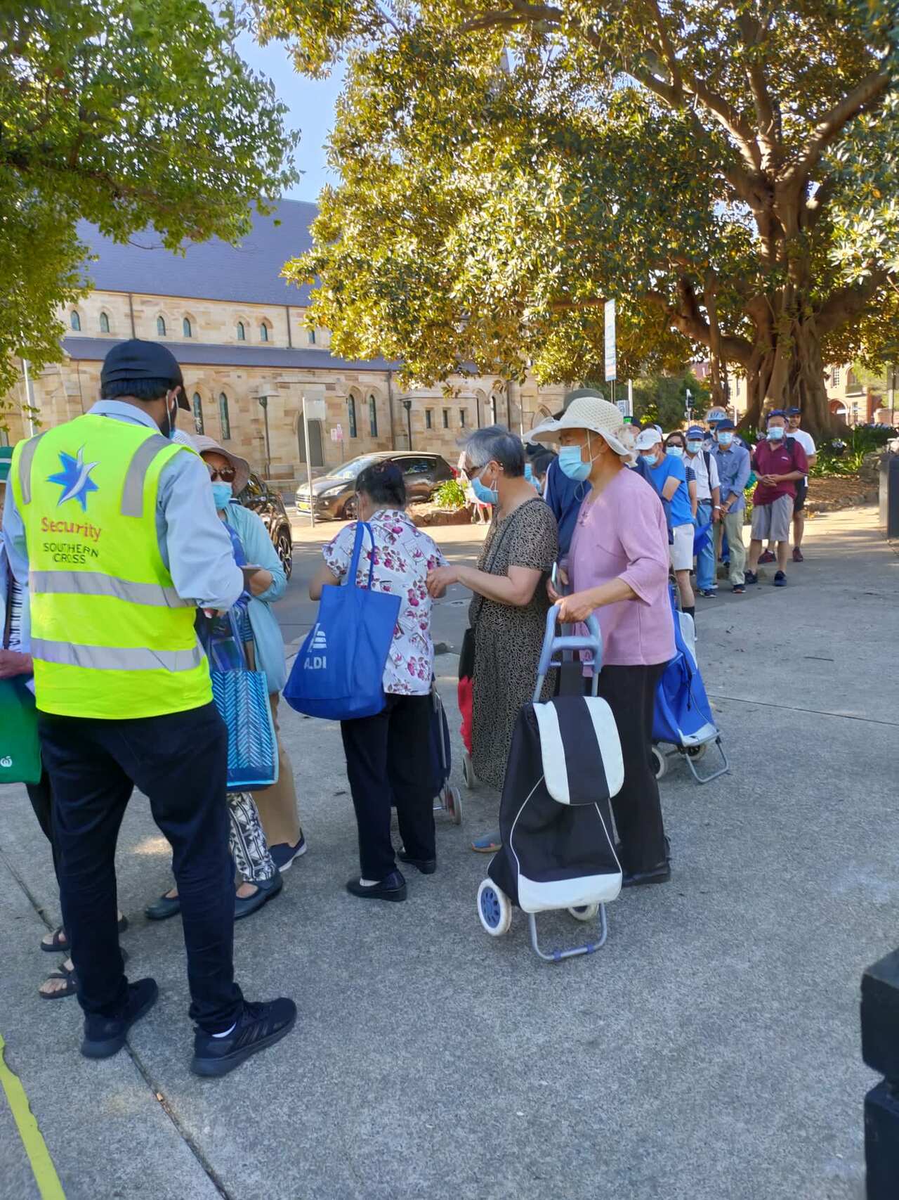 Language barrier prevents charity from understanding increase in elderly Asians queueing for food handouts.