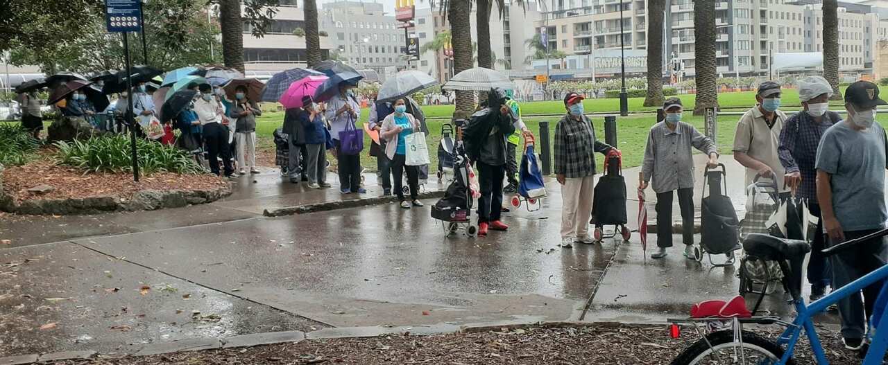 For months, dozens of “decently dressed” senior Asians have been queueing up for food hampers in Sydney’s west.