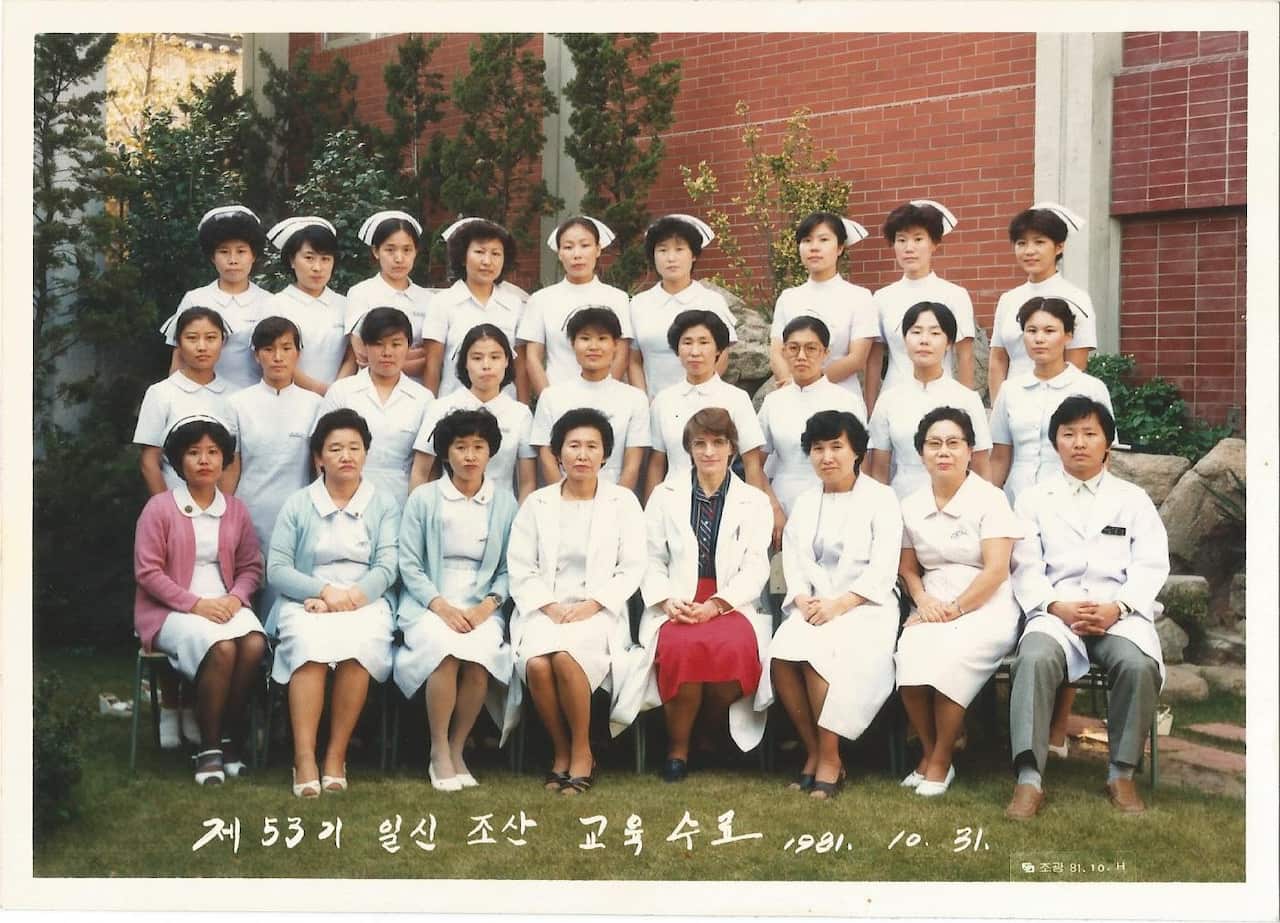 Dr Barbara Martin(centre) with midwifery graduates in Ilsin Women's hospital in 1981