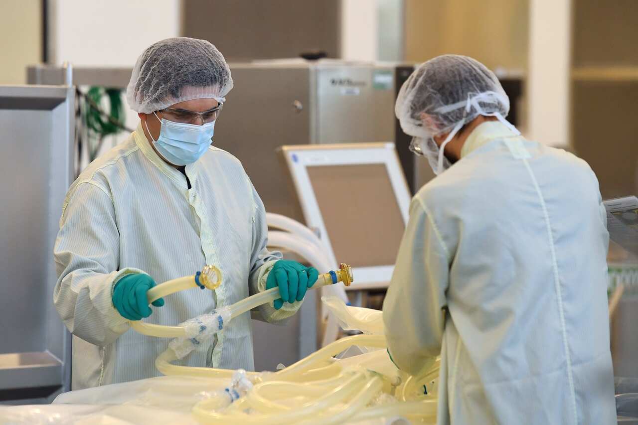 Scientists are seen at work inside of the CSL Biotech facility in Melbourne.
