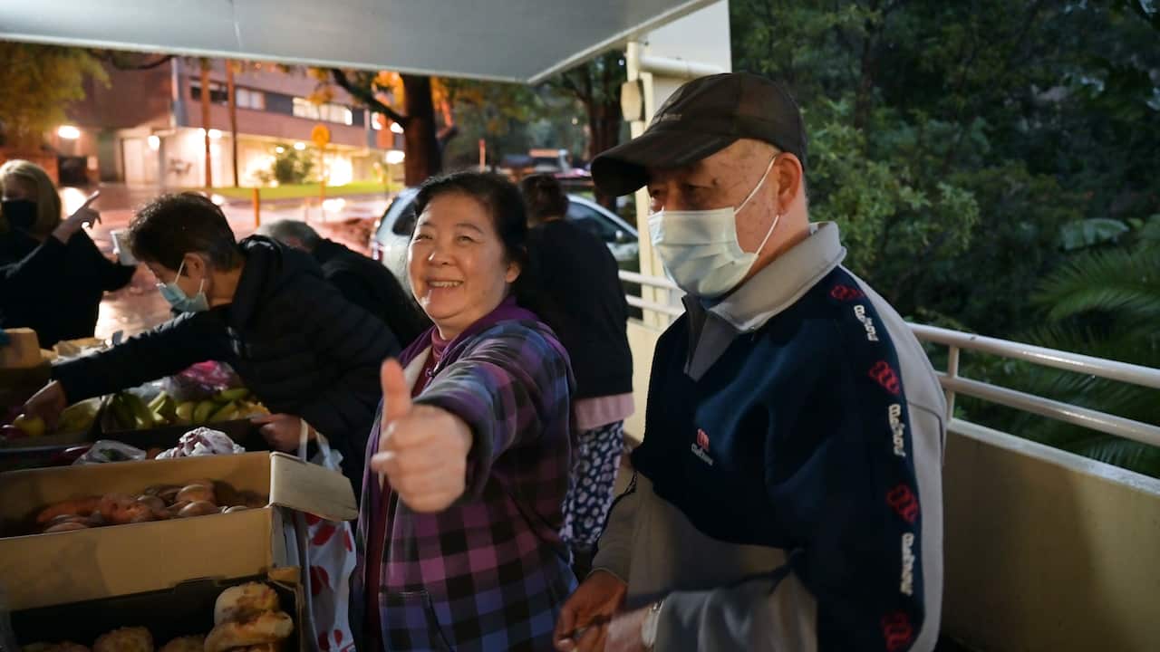People visiting the soup kitchen for hot food, nutritious meal, fruit, and drinks. 