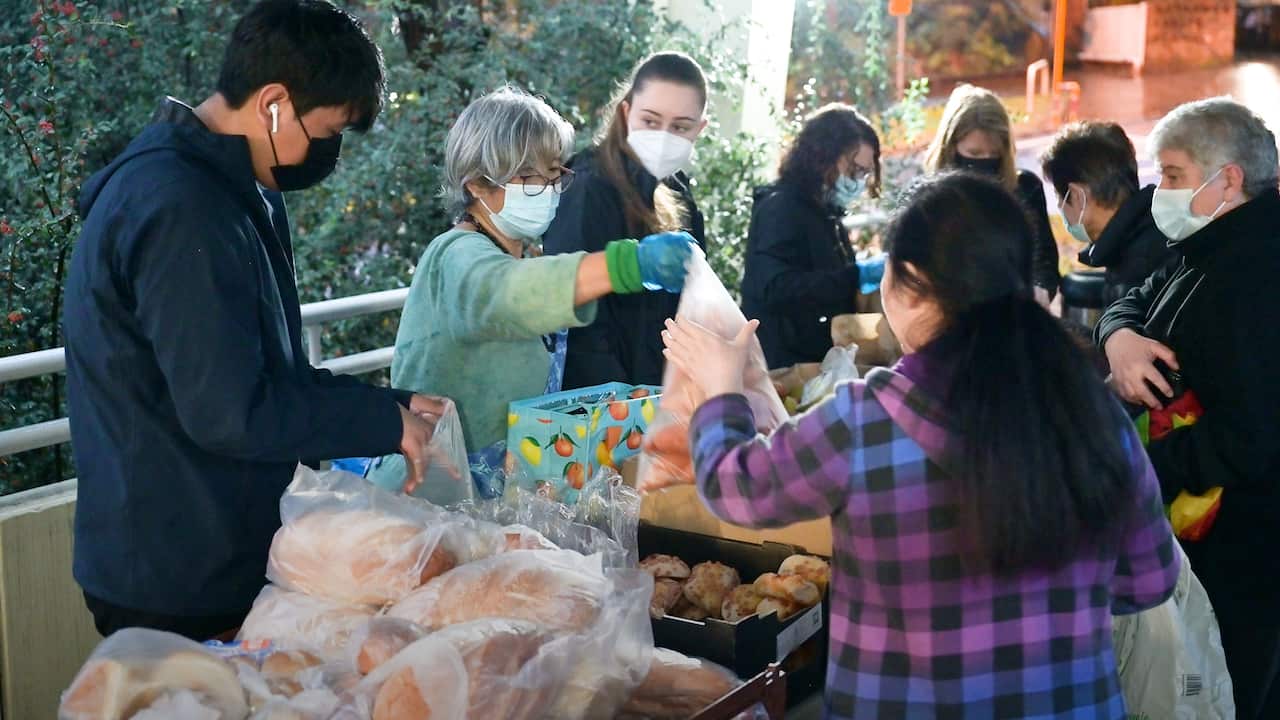 Alice Fong with volunteers handing out food in Sydney's North Shore.