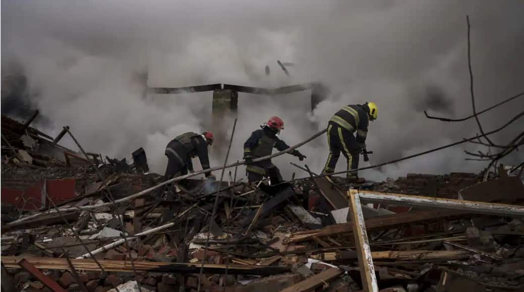 Firefighters work to extinguish a fire after a Russian attack destroyed the building of a Culinary School in Kharkiv, Ukraine.