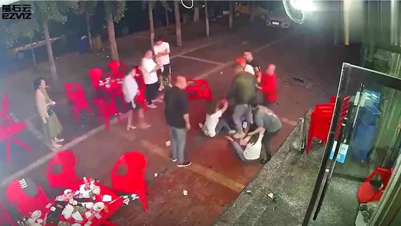 CCTV recorded a group of men attacking three women in a restaurant.