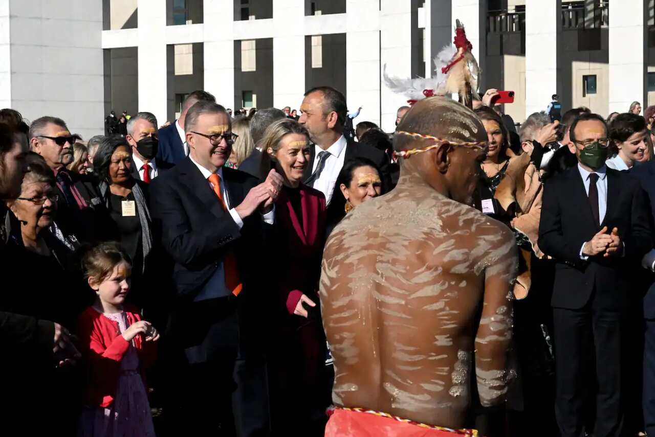 Prime Minister Anthony Albanese and partner Jodie Haydon at a smoking ceremony in the forecourt during the opening of the 47th Federal Parliament at Parliament House in Canberra, Tuesday, July 26, 2022.