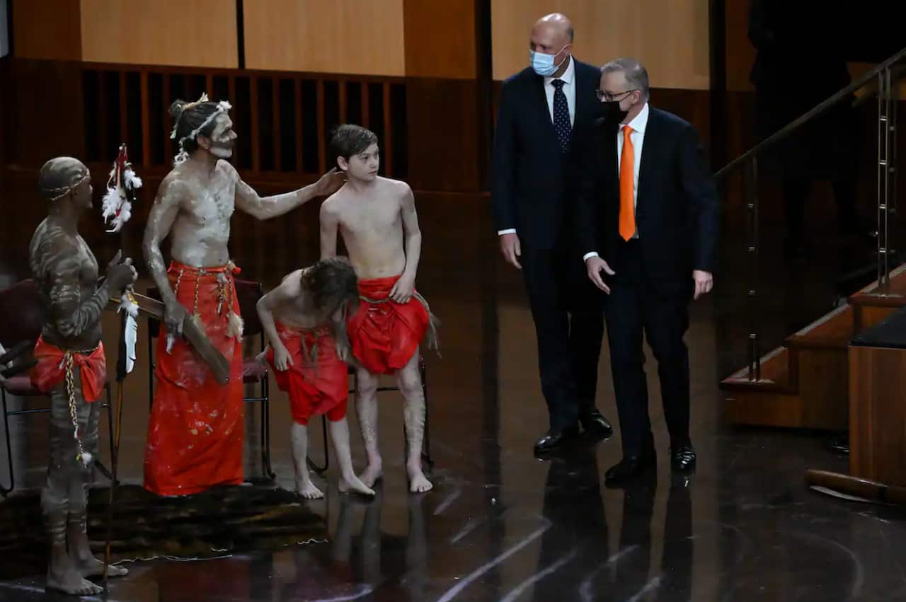Prime Minister Anthony Albanese (right) and Opposition leader Peter Dutton with traditional dancers during the opening of the 47th Federal Parliament at Parliament House in Canberra.
