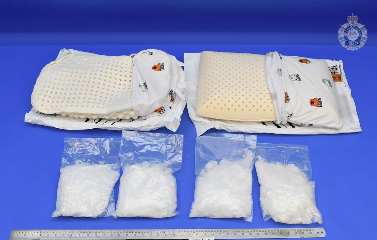 Ninety-nine kilograms of meth was hidden in a 550-kilogram shipment of latex bed pillows.