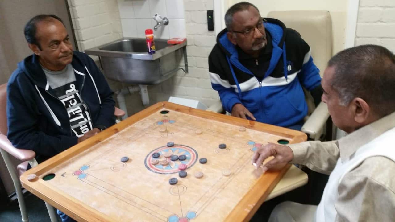 Senior citizens playing indoor games