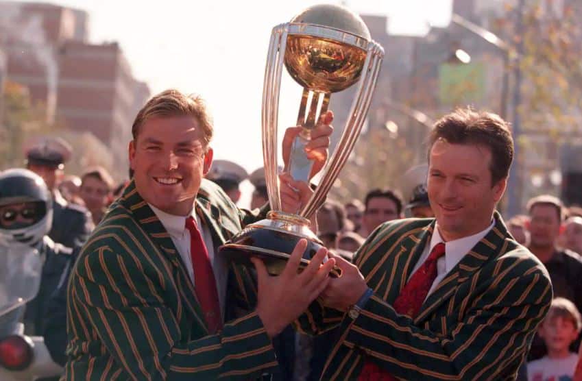 Shane Warne (left) and Steve Waugh hold the World Cup Trophy during a Ticker-tape Parade through Melbourne