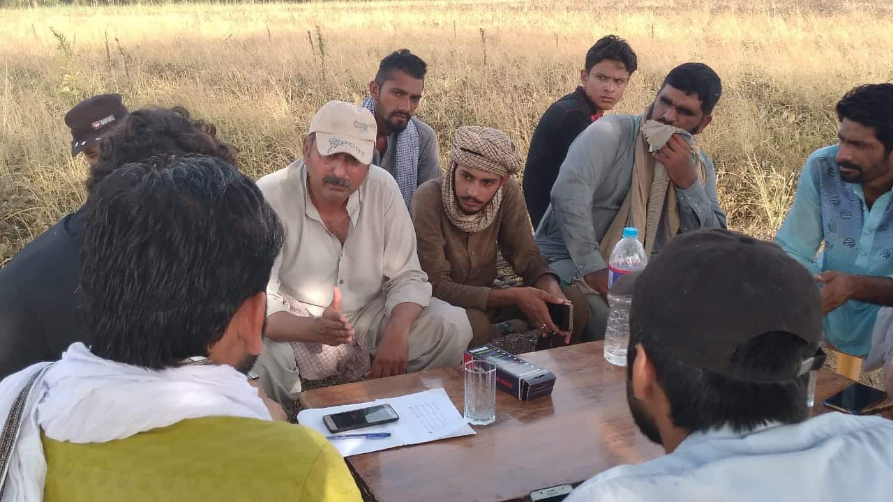 Pakistani farmer Sheeraz Sindhu (2nd left) hopes to overcome water challenges with the better ground water management.