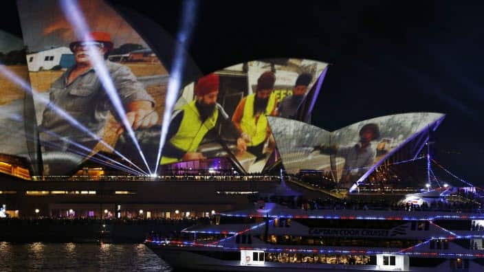 Sydney Opera House sails illuminate with image of Sikhs helping bushfire victims