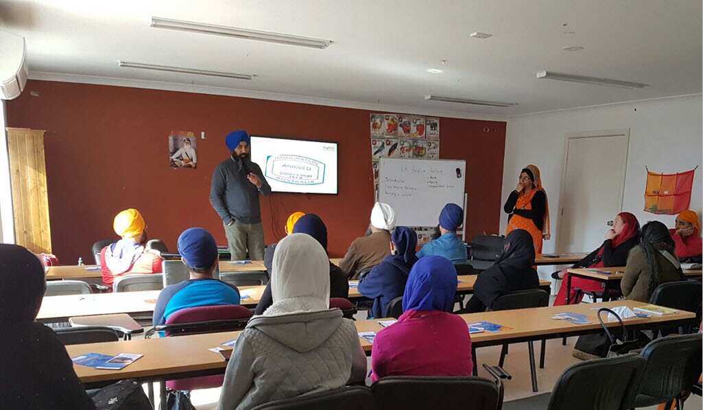 Volunteers being trained for answering calls to Sikh Helpline at Craigieburn gurudwara in 2016