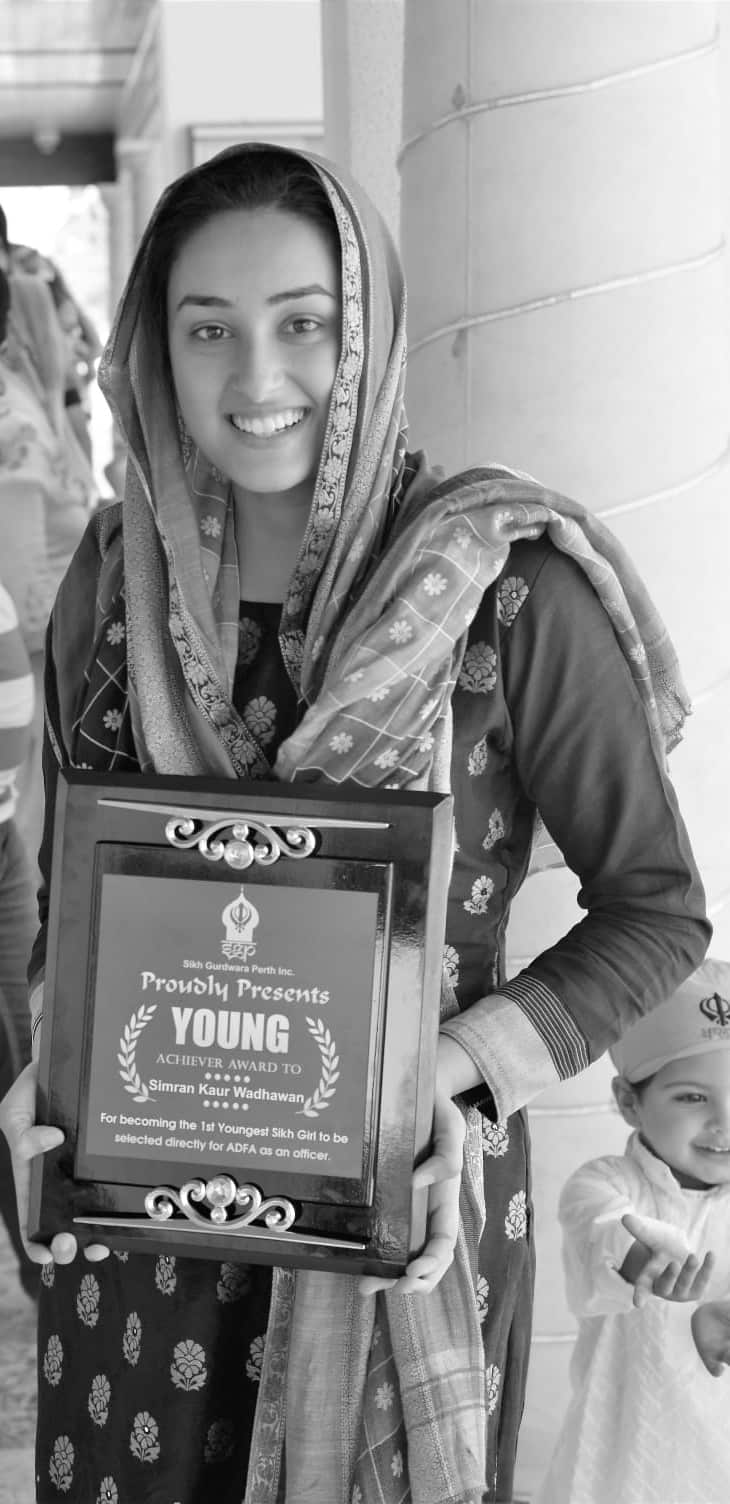 Simran kaur Wadhawan being felicitated at the Gurudwara in Perth