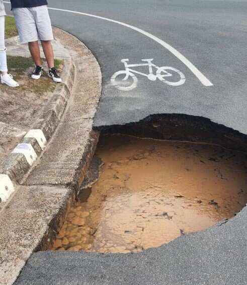 The sinkhole was in the middle of a bicycle lane causing concern for riders.
