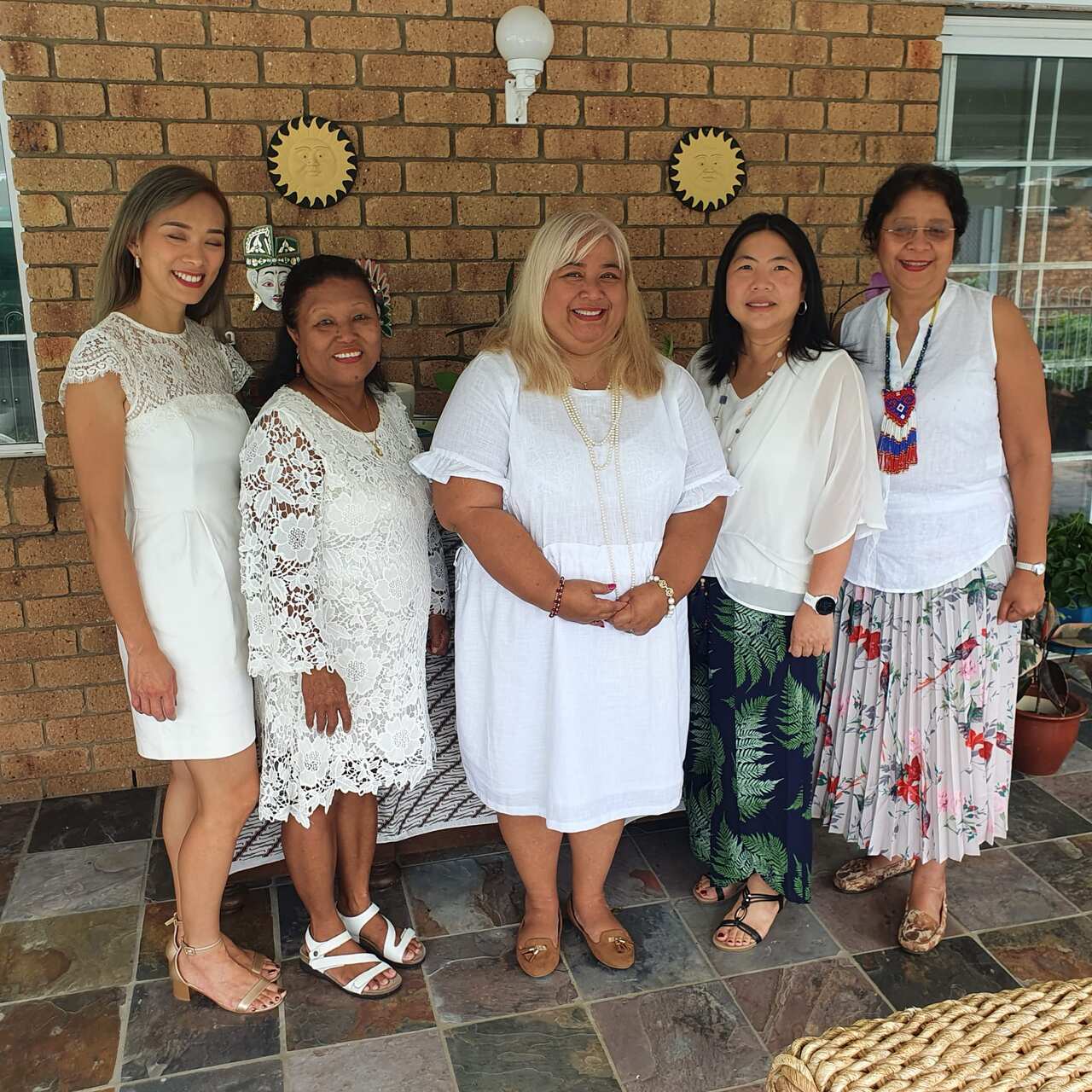 Siti (second from left) working with Caring is Culture. 