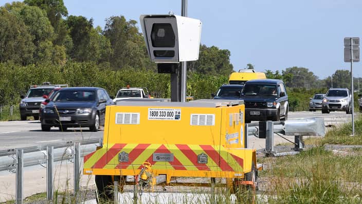 A mobile speed camera is seen on the M1 Motorway south of Brisbane, Monday, January 15, 2018. (AAP Image/Dave Hunt) NO ARCHIVING
