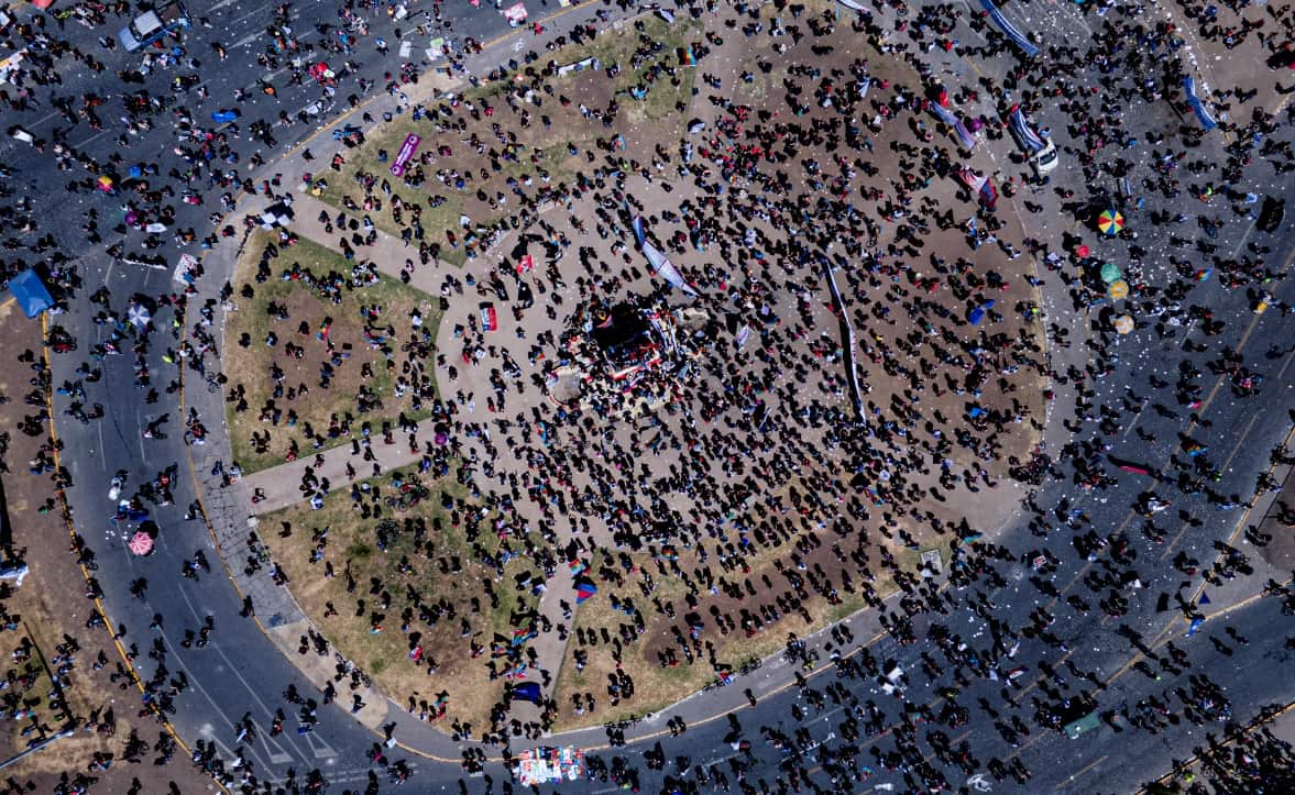 Protesters commemorate the one-year anniversary of the start of massive anti-government protests.
