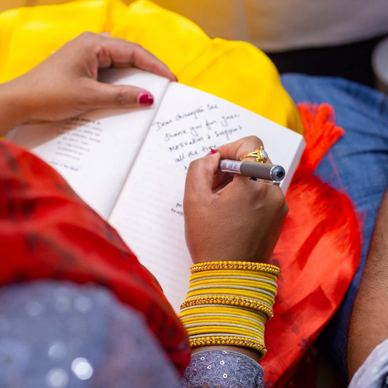 Parisccano writer Niru Tripathi signing her book