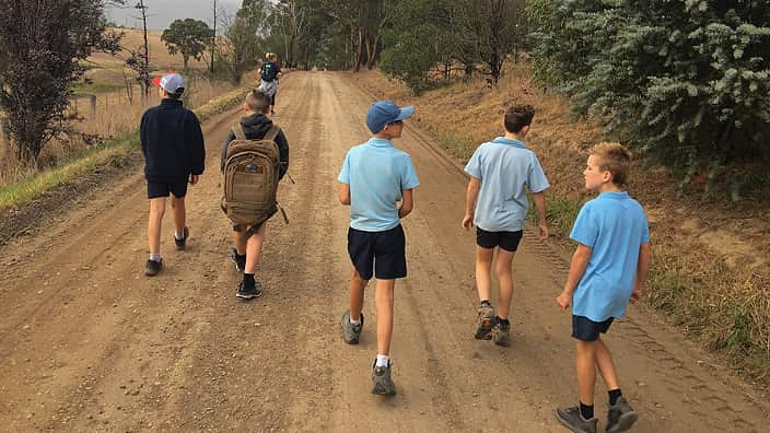 Oscar and Digby's peers, from Arthurs Creek Primary School walk to school to support them