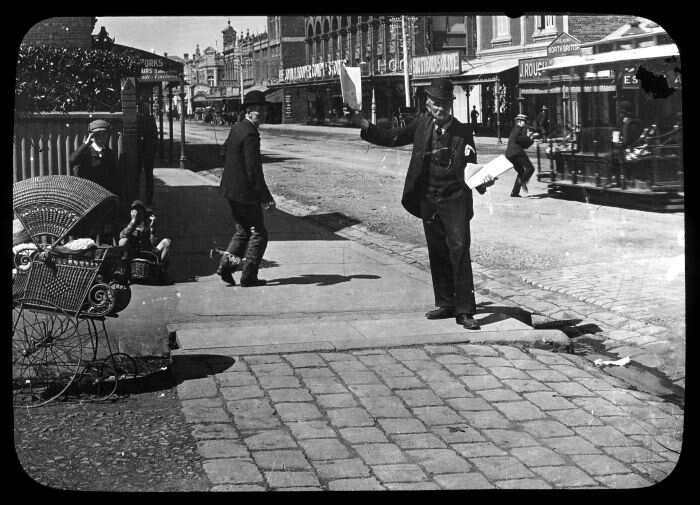 Newspaper seller, corner Blyth Street and Sydney Road, post 1880.