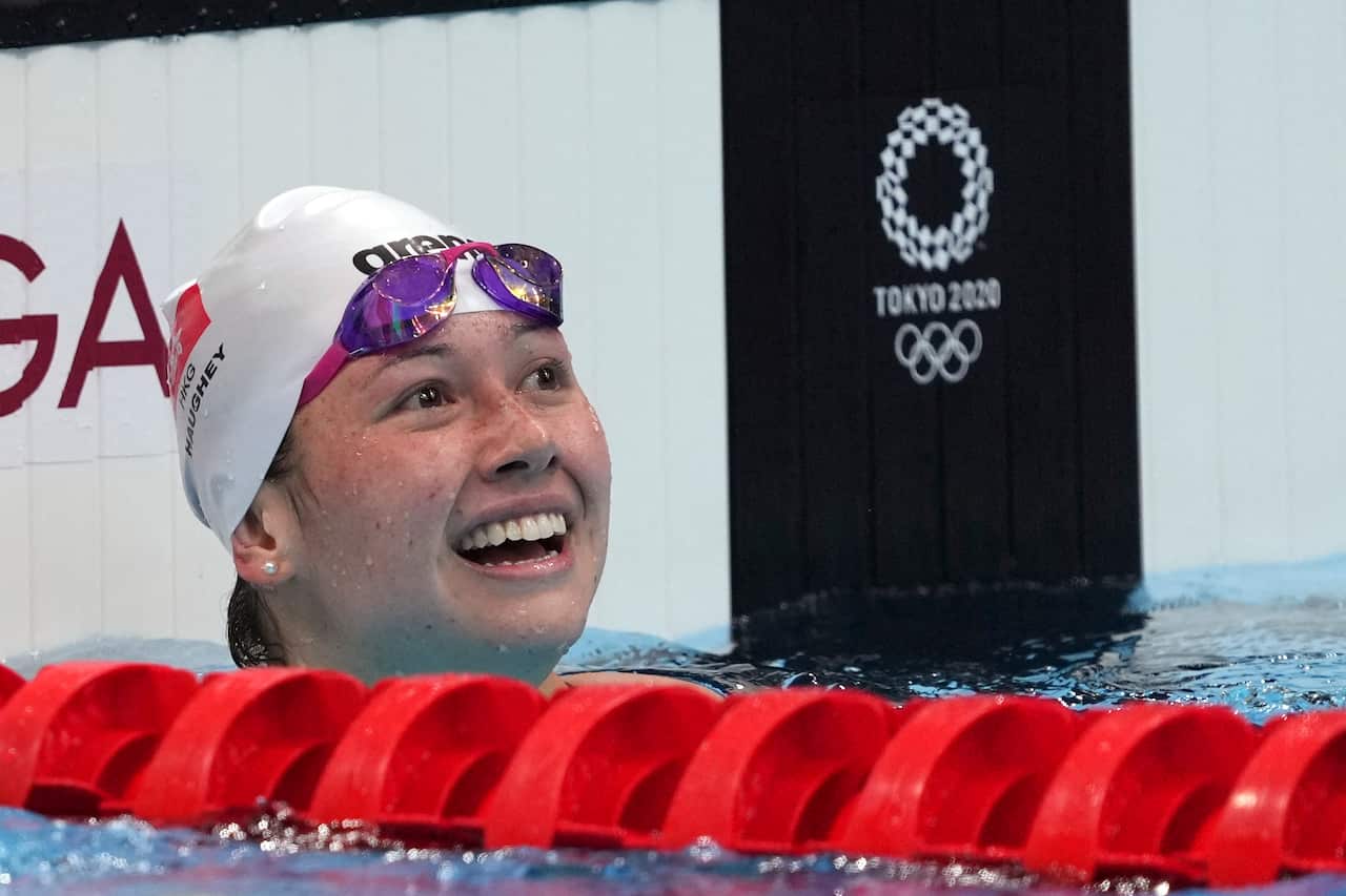 Siobhan Bernadette Haughey of Hong Kong smiles after the women's 200-meter freestyle final at the 2020 Summer Olympics, Wednesday, July 28, 2021, in Tokyo, Japan. (AP Photo/Matthias Schrader)